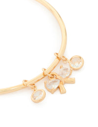 Featuring gold cubic zirconia bow charm toggle bracelet close up view - link has visual effect only