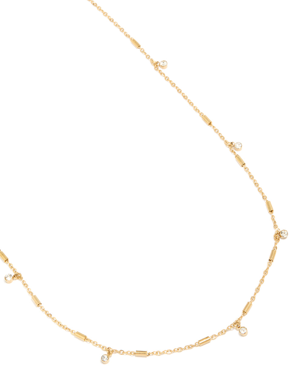 Presenting a waterproof body chain featuring charm details, crafted from gold plated stainless steel with cubic zirconia in a dainty style close up view