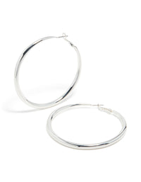 Featuring silver plated dome hoop earrings with closure in silver front view - link has visual effect only