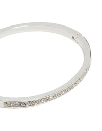 Featuring a silver plated bezel diamante tennis bracelet with close up view - link has visual effect only