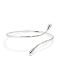 Showcasing a molten drop arm cuff crafted from silver plated metal with statement styling front view - link has visual effect only