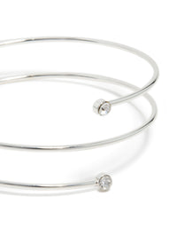 This silver diamante thin wrap arm cuff bangle showcases stone settings in a close up view - link has visual effect only