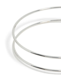 Highlighting the silver diamante thin wrap arm cuff bangle with polished metal finish closure detail view - link has visual effect only