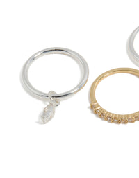 Featuring mixed metal plated organic cubic zirconia rings 4-pack with charm in gold and silver tones close up view - link has visual effect only