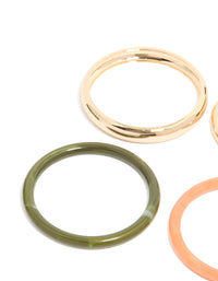 Featuring gold and mixed acrylic bangles in a 4-pack with close up view - link has visual effect only
