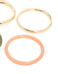 Featuring gold and mixed acrylic bangles in a 4-pack with close up view - link has visual effect only