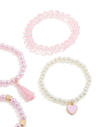 Showcasing kids beaded pearl and heart stretch bracelets in a 5-pack featuring tassel details in gold, light pink, ivory, and salmon hues close up view - link has visual effect only