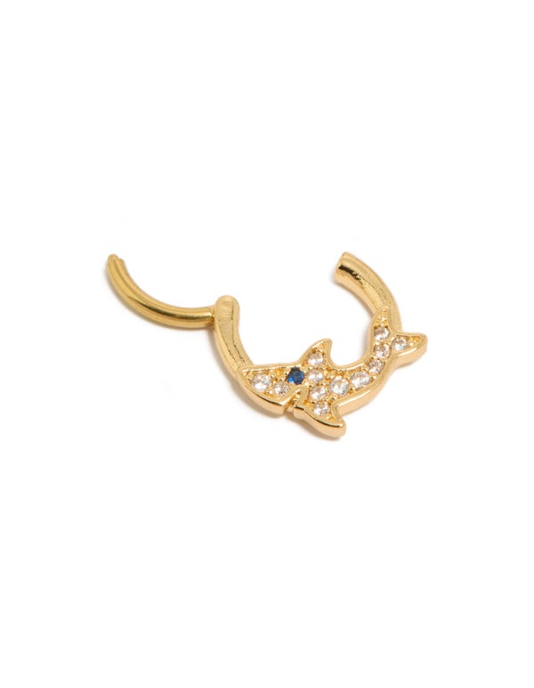 Highlighting a statement shark clicker ring made from surgical steel with cubic zirconia embellishments in gold plated finish featuring ocean motif detail view