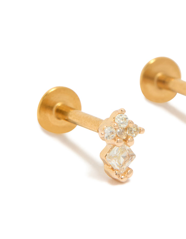 Showcasing kids mini diamond flat back studs crafted from surgical steel with cubic zirconia in gold plated finish close up view
