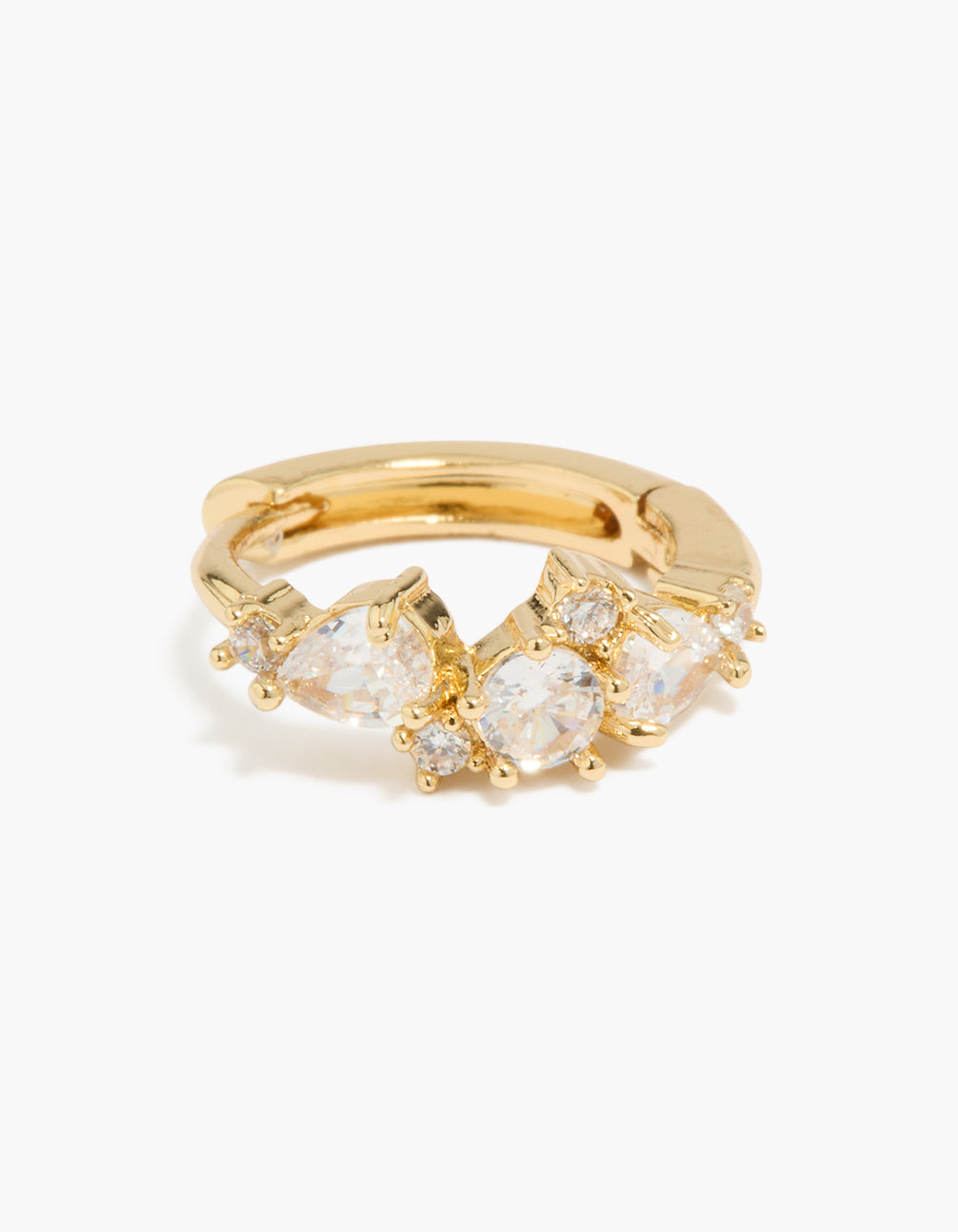 Highlighting gold plated large mixed cubic zirconia huggie earrings with clear accents close up view
