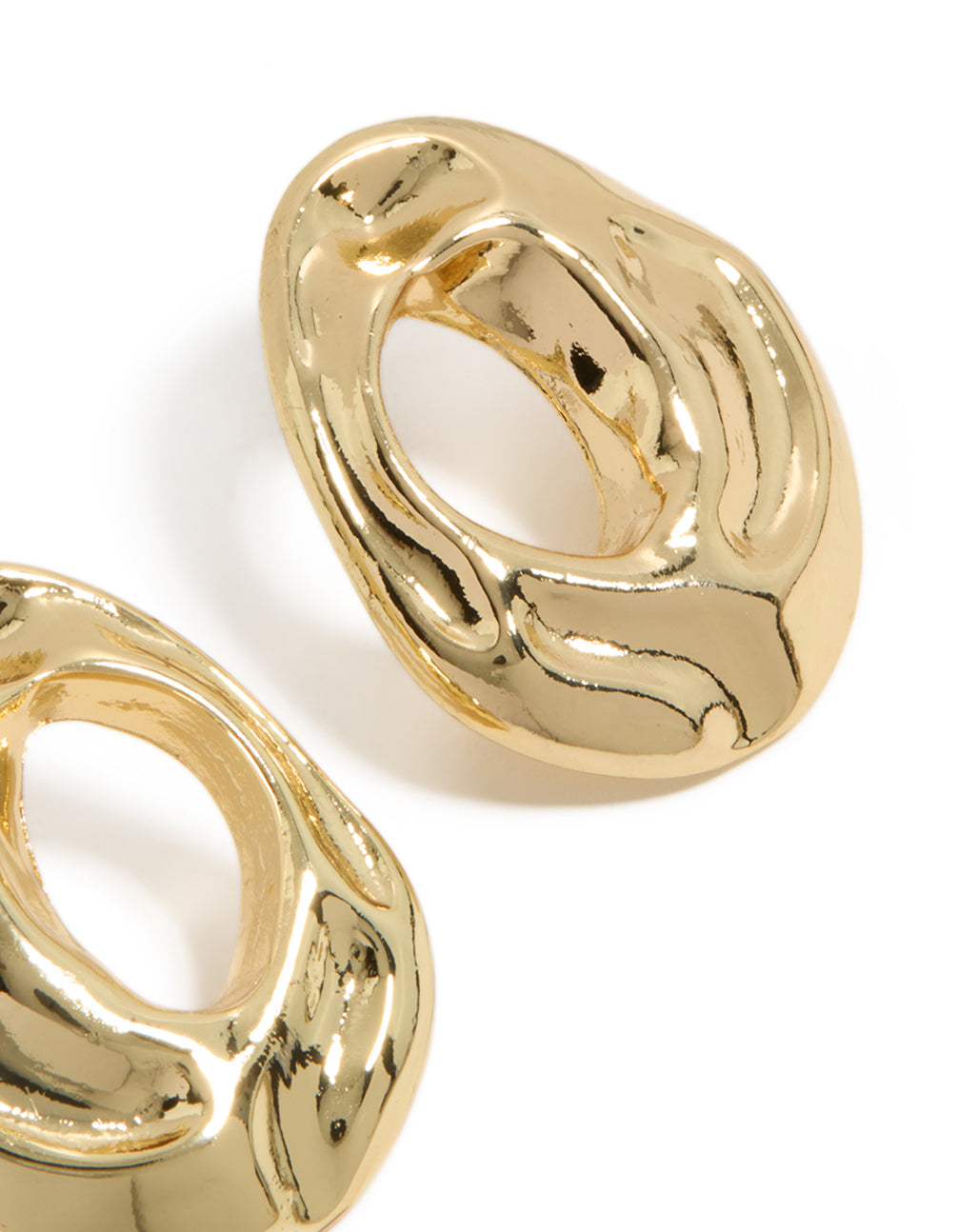 Showcasing open organic circle stud earrings with gold plated finish post detail view