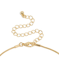 Highlighting a gold plated organic circle pendant necklace with clasp detail view - link has visual effect only
