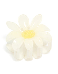 Featuring a glossy daisy flower claw clip in ivory, yellow front view - link has visual effect only