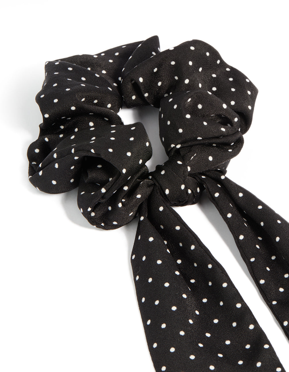 Featuring a polkadot fabric micro spot long scarf in black and white side view