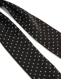 Crafted from polkadot fabric micro spot long scarf in black and white detail view - link has visual effect only
