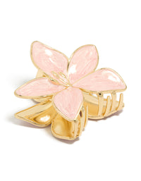 Showcasing a floral enamel claw clip in light pink and gold front view - link has visual effect only