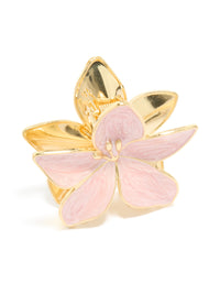 Featuring a light pink enamel floral claw clip with gold accents side view - link has visual effect only
