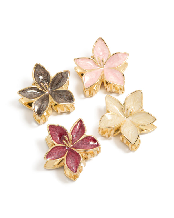 Discover gold pink burgundy enamel frangipani claw clips in a 4-pack with floral design and glitter accents front view