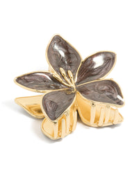 Crafted from enamel, this floral frangipani flower stem claw clip features marbled brown in gold front view - link has visual effect only