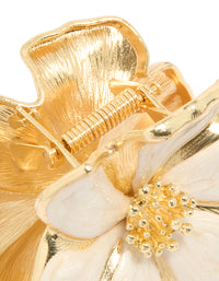 Captivating enamel blossom flower hair claw clip with closure mechanism in gold and beige detail view - link has visual effect only