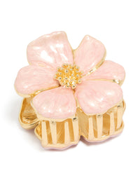 Showcasing a floral enamel blossom hair claw clip detailing in light pink and gold front view - link has visual effect only