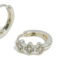 Explore dainty waterproof stainless steel cubic zirconia triple flower huggie earrings designed with crystal embellishments in silver post detail view - link has visual effect only