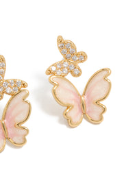 Featuring small butterfly stud earrings in gold plated finish with pink enamel and cubic zirconia post detail view - link has visual effect only