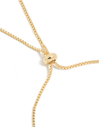 Crafted from gold plated material, this floral bracelet displays cubic zirconia embellishments with white inlay and toggle closure detail view - link has visual effect only