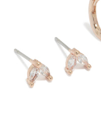 Featuring rose gold plated cubic zirconia stud and huggie earrings 2-pack with baguette stone cut close up view - link has visual effect only