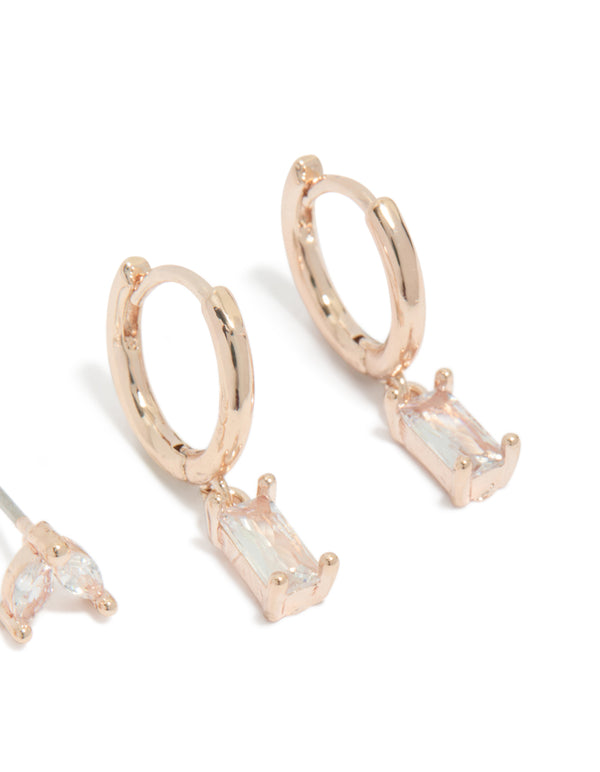 Crafted from rose gold plated cubic zirconia stud and huggie earrings 2-pack with baguette stone cut post detail view