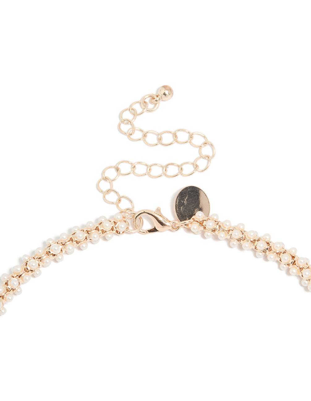 Highlighting the rose gold plated mini pearls fireball necklace with beads with statement detailing clasp detail view