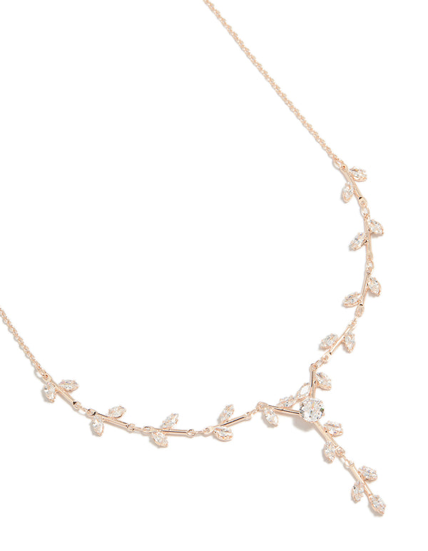 Showcasing a vine spaced necklace with floral and leaf details, crafted from cubic zirconia in rose gold plated finishes, featuring statement styling close up view