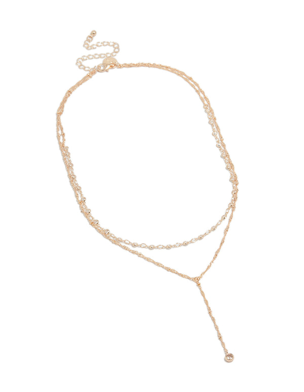 Elegant rose gold plated cubic zirconia bezel set layered chain Y-necklace with in statement styling front view