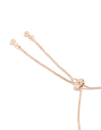 Designed with cubic zirconia flowers in rose gold plated toggle bracelet closure detail view - link has visual effect only