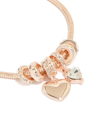 Featuring a rose gold plated diamante heart charm toggle bracelet with dainty design close up view - link has visual effect only