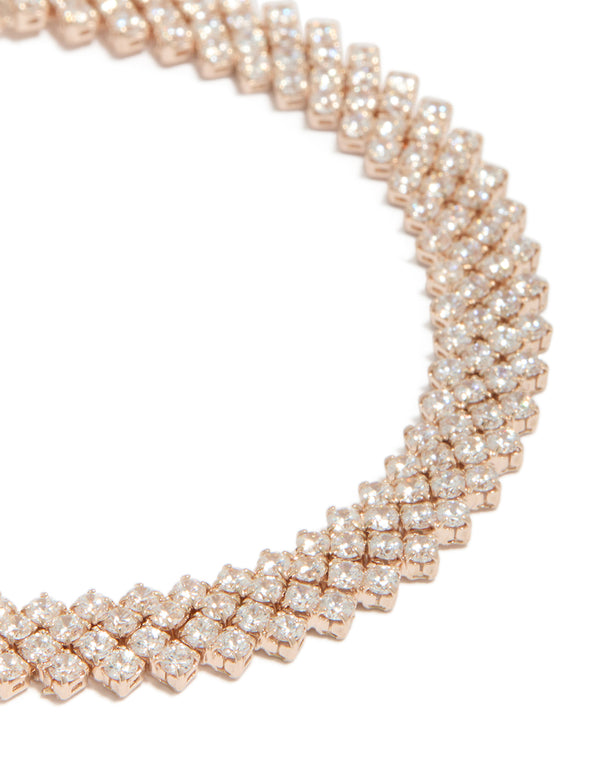 Crafted from rose gold plated cubic zirconia diagonal tennis bracelet with round stone cut close up view
