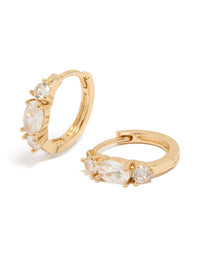 Showcasing dainty huggie earrings crafted from cubic zirconia in gold front view - link has visual effect only