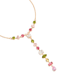 Showcasing a cubic zirconia mismatched colourful stones necklace in gold close up view - link has visual effect only