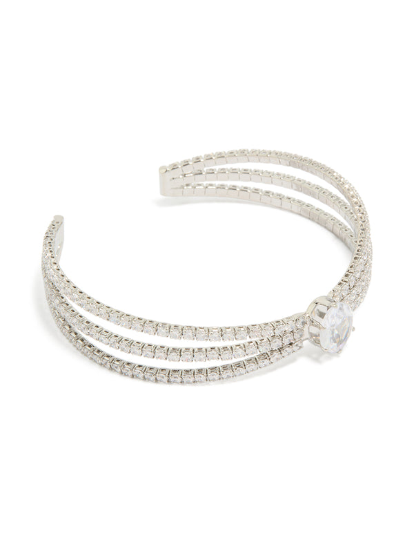Showcasing a statement wrist cuff crafted from cubic zirconia with oval stone cut in silver front view