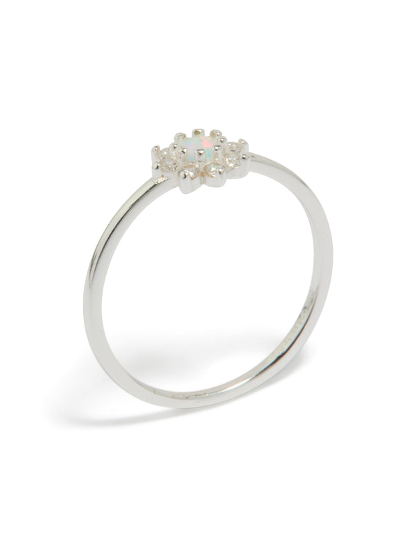 Beautiful sterling silver cubic zirconia faux opal star ring featuring celestial design front view