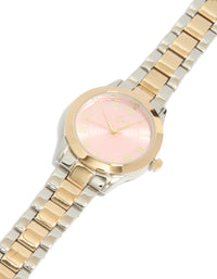 Showcasing a mixed metal pink face roman numeral watch with numbers on a round dial, designed for women in casual settings, featuring a multi-color link band and analog type watch face detail view - link has visual effect only