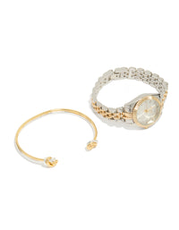 Elegantly styled mixed metal knotted wrist cuff and watch set featuring silver dial with stone look, round shape, link band designed for women's formal occasions, analog type, silver plated material, gold accents front view - link has visual effect only