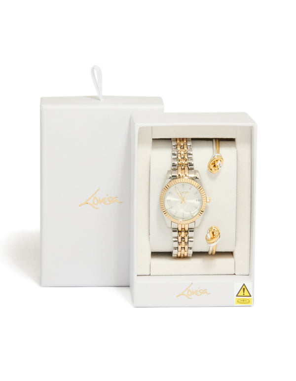 Showcasing mixed metal knotted wrist cuff and watch set with silver dial featuring stone look, round shape, link band, designed for women's formal occasions, analog type, silver plated material, gold accents case detail view