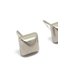 Showcasing mens waterproof stainless steel studded earrings in silver featuring stud closure close up view - link has visual effect only
