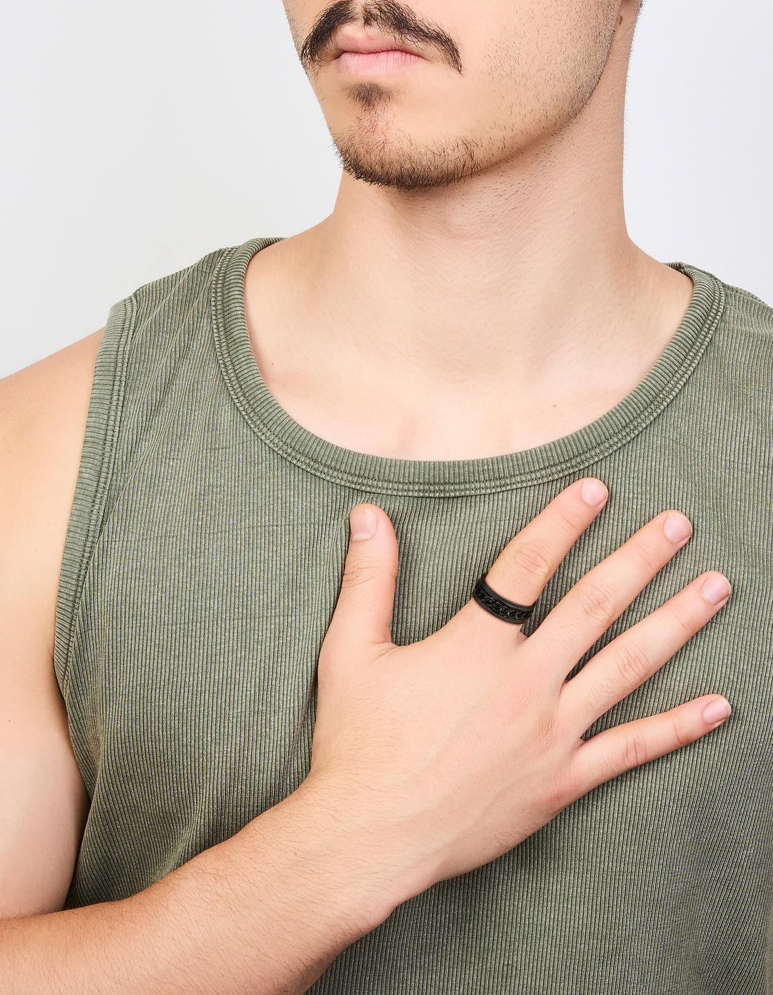 Featuring a mens waterproof black coated stainless steel chain detail band ring on model view