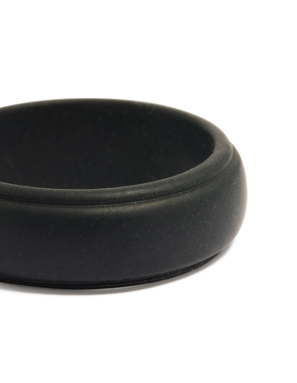 Featuring a waterproof mens silicone band ring in black close up view