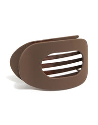 Featuring a solid chocolate brown matte flat oval claw clip front view - link has visual effect only