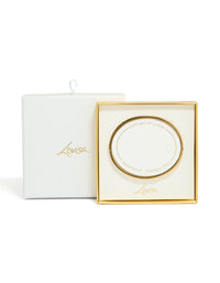 Showcasing a waterproof gold plated stainless steel hinged bangle featuring cubic zirconia inlay with white enamel detailing front view - link has visual effect only