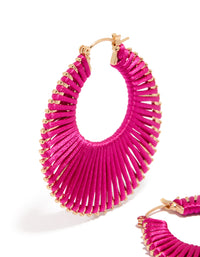 Capturing hot pink threaded hoop earrings gold accents close up view - link has visual effect only
