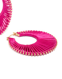 Displaying statement hoop earrings in hot pink and gold detail view - link has visual effect only